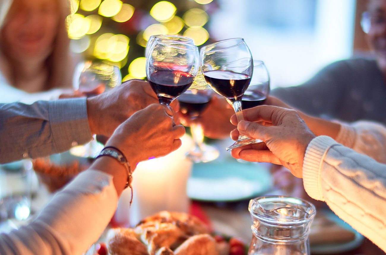 Guests celebrate the festive season with wine