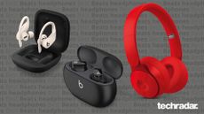 three pairs of beats headphones on a grey background