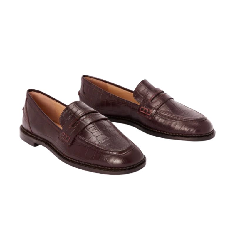 A cutout of oxblood red mock croc loafers by Boden
