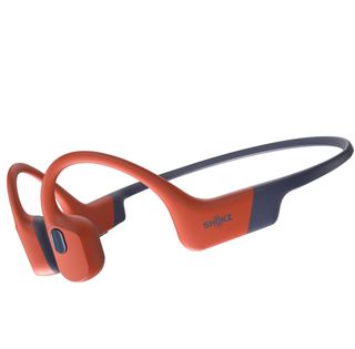 Orange Shokz openswim pro headphones on a white background