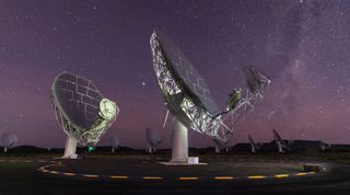 Two of the 64 dishes that makes up the MeerKAT radio telescope.