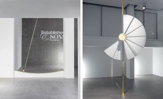 Left: The 'Pendulum' clock is made up of a long, brass rod with a small brush on its end suspended from the ceiling. It swings back and forth over an arched brass strip, the bristles polishing it as it moves. Right: The 'Fan' clock, meanwhile, comprises a brass disc that gradually unfolds over the space of five minutes, forming a full circle before snapping back shut