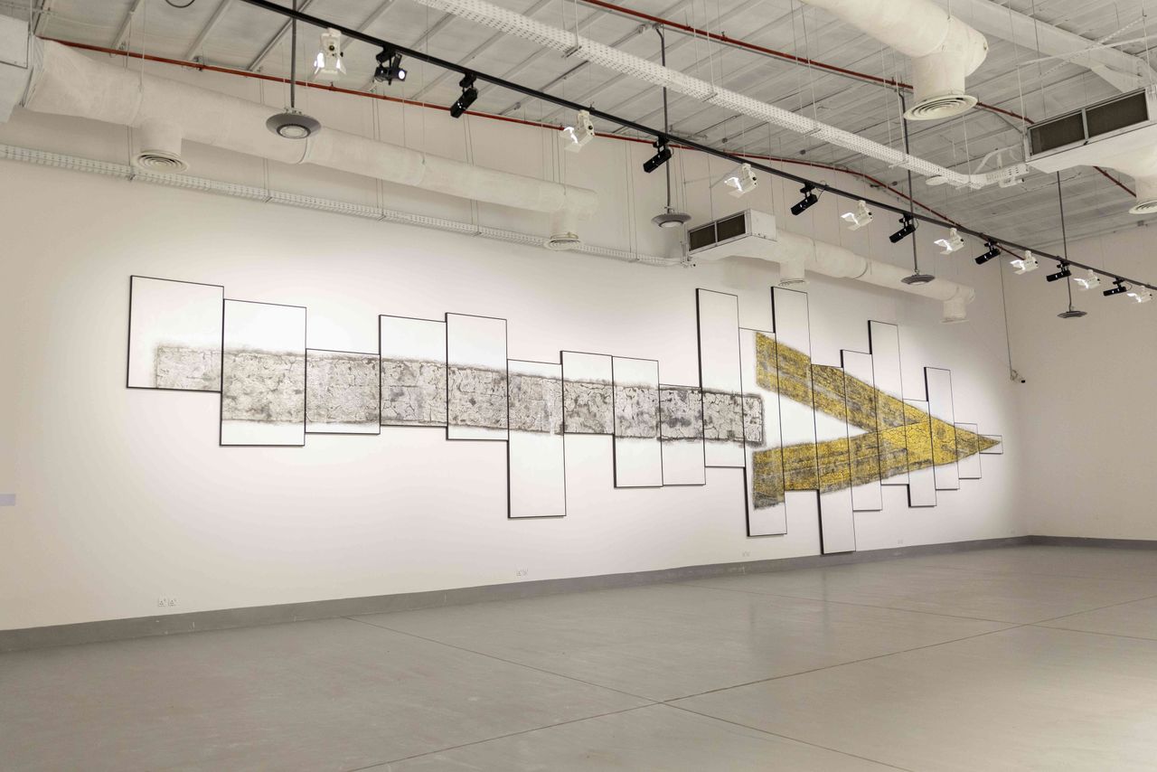 Winning artwork from 2021 Ithra Art Prize, in the form of an arrow on a gallery wall