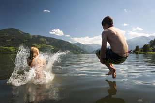 jumping in lake, lake, swimming