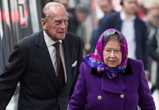 Her Majesty Queen Elizabeth II and Prince Philip, Duke of Edinburgh arrive at King's Lynn Station on December 21, 2017