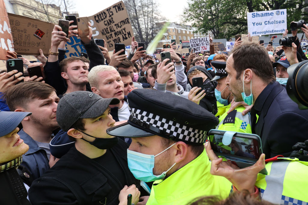 LONDON, ENGLAND - 20 April 2021: Former Chelsea goalkeeper Petr Cech calls for calm as fans gather to protest the introduction of the European Super League on April 20, 2021 in London, United Kingdom. Six English Premier League teams have announced they are part of plans for a breakaway European Super League. Arsenal, Manchester United, Manchester City, Liverpool and Tottenham Hotspur will join 12 other European teams in a closed league similar to that of the NFL American Football League. In a statement released last night, the new competition 