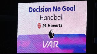 The VAR screen shows that a late Arsenal goal has been disallowed in the Gunners' 1-0 loss at Aston Villa in December 2023.
