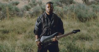 The Sterling By Music Man Kaizen is a more affordable version of the Animals As Leaders guitarist Tosin Abasi's signature model, and is offered here in Firemist Purple Satin and Stealth Black. 