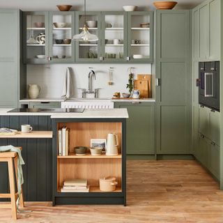 green Shaker kitchen with blue kitchen island