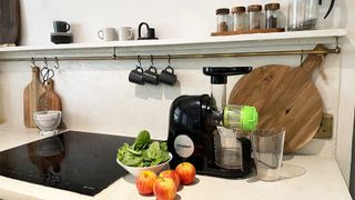 Black juicer from Amazon on kitchen worktop