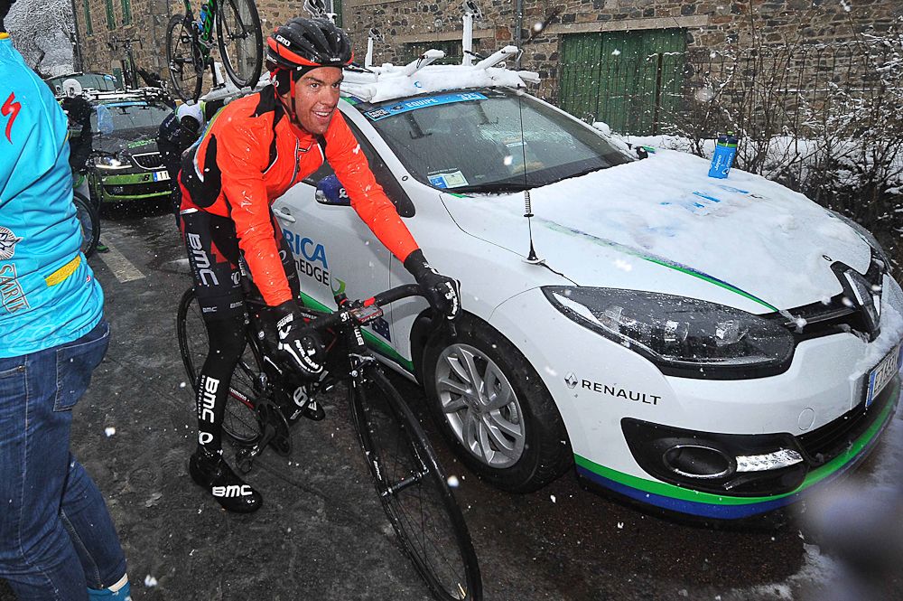 BMC's Richie Porte climbs off his bike