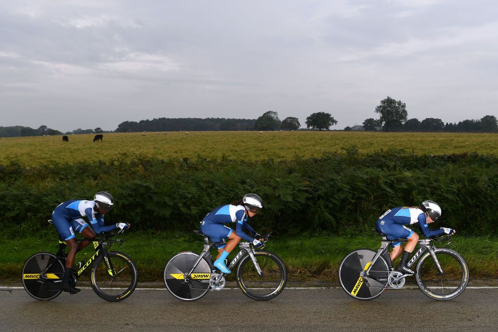 HARROGATE ENGLAND SEPTEMBER 22 Teniel Campbell of Trinidad Tobago Anastasiya Kolesava of Belarus Fernanda Yapura of Argentina Team UCI World Cycling Centre Rain during the 92nd UCI Road World Championships 2019 Team Time Trial Mixed Relay a 276km Men Women Team Time Trial race from Harrogate to Harrogate TTT Yorkshire2019 Yorkshire2019 on September 22 2019 in Harrogate England Photo by Justin SetterfieldGetty Images