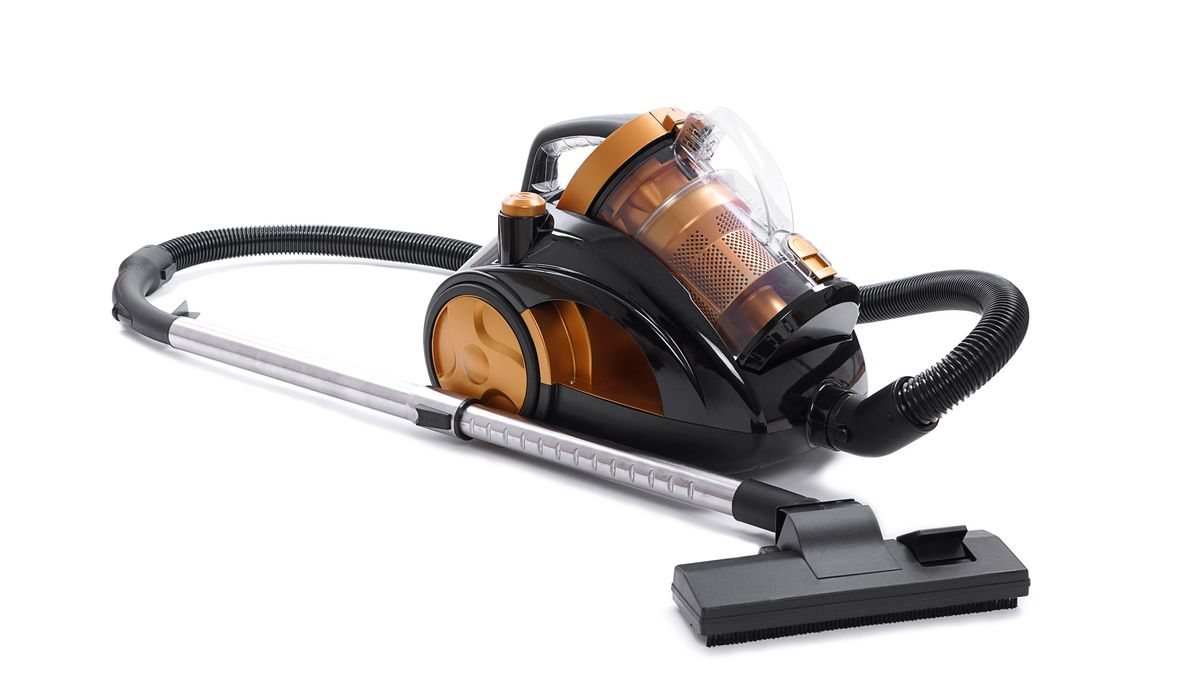 Bagless canister vacuum on a white background