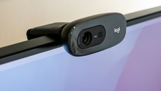 A Logitech C270 HD webcam on a monitor; one of the best Mac webcams