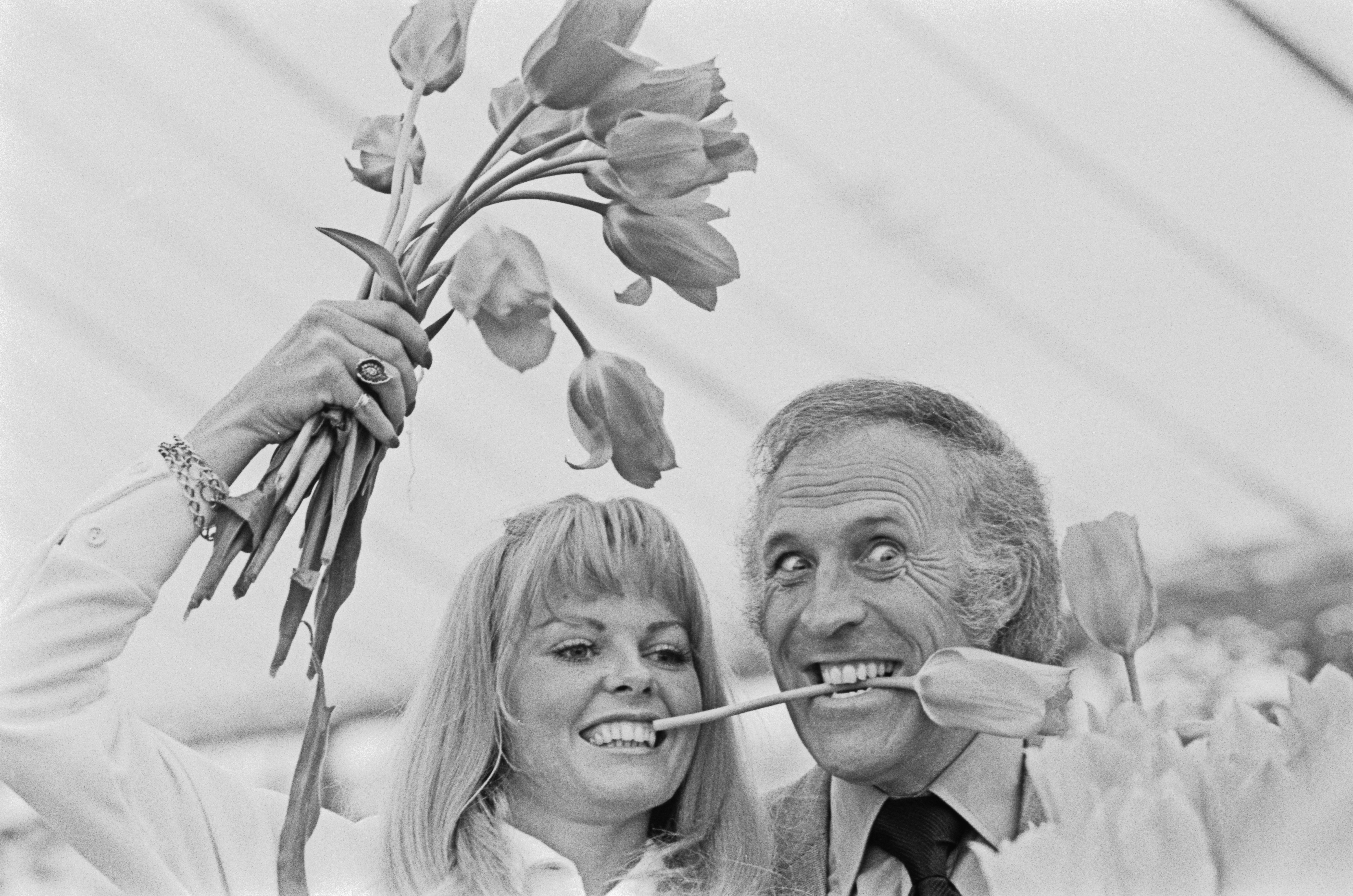 Bruce Forsyth with Anthea Redfern, his co-host on the BBC game show 'The Generation Game', in 1973. The pair were married later that year.