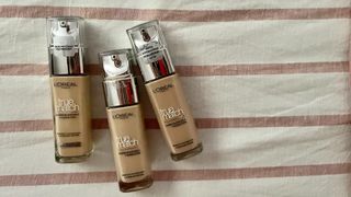 A lineup of three L'Oreal True Match Foundations for the purpose of eview