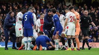 Chelsea's Cesar Azpilicueta receives medical attention after taking a blow to the head in the Blues' Premier League game against Southampton in February 2023.