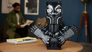 A lifestyle shot of the Lego Marvel Black Panther set, perched on a tabletop