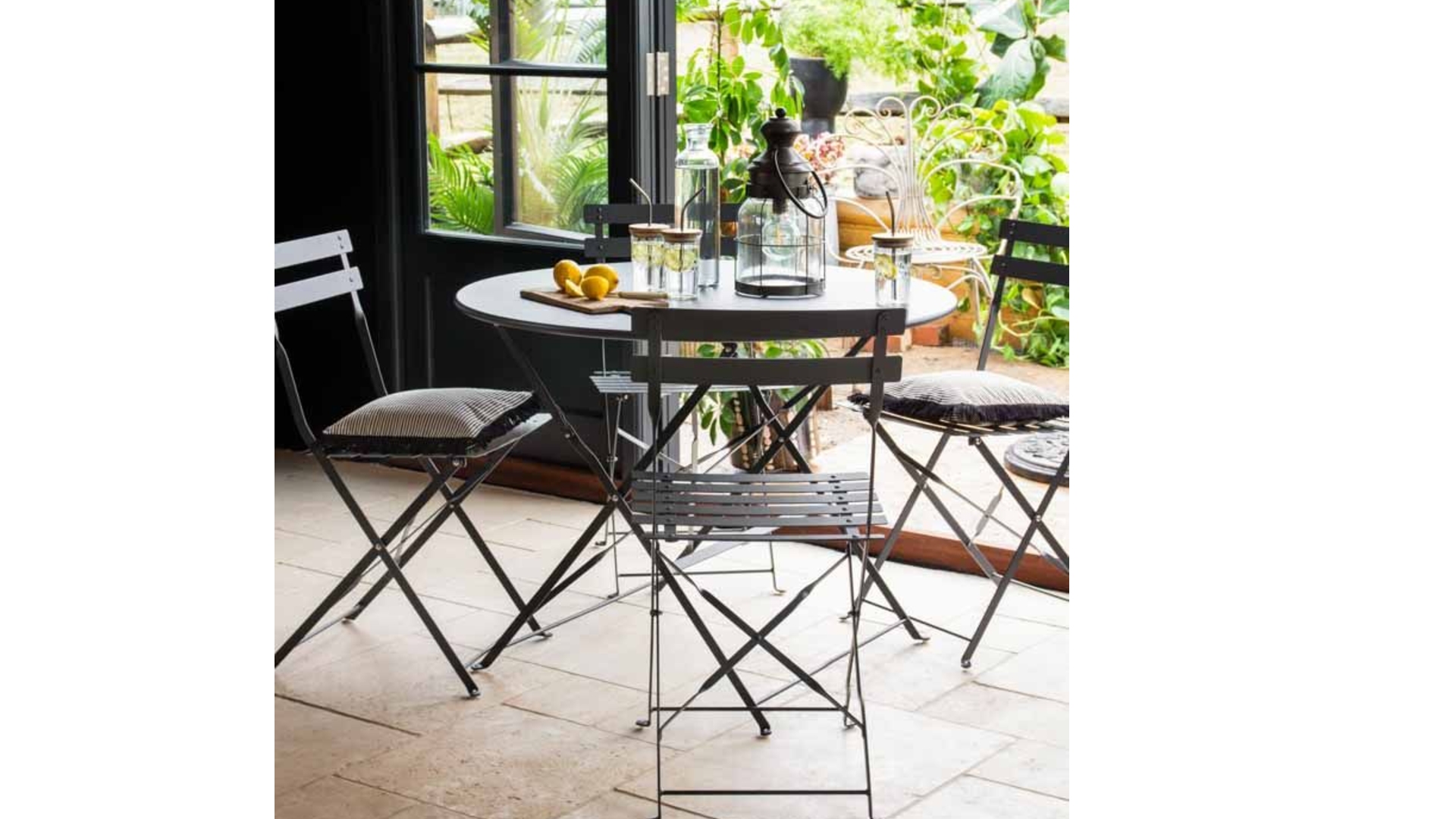Best metal garden furniture 2021 - metal bistro table and chairs four-seater - Rocket St George