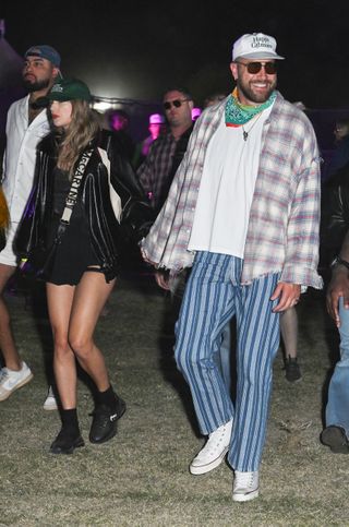 Taylor Swift and Travis Kelce hold hands while walking around at Coachella