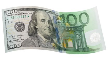€100 bill merged with €100 note © Getty Images/iStockphoto