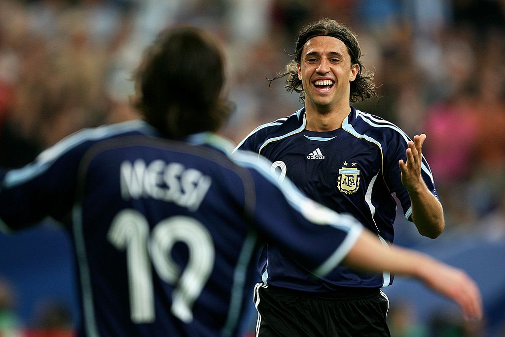 Lionel Messi of Argentina is congratulated by Hernan Crespo of Argentina after Crespo scored the fourth goal during the FIFA World Cup Germany 2006 Group C match between Argentina and Serbia & Montenegro at the Stadium Gelsenkirchen on June 16, 2006 in Gelsenkirchen, Germany.