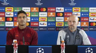MANCHESTER, UNITED KINGDOM - OCTOBER 2: Head coach Erik ten Hag (R) and Raphael Varane (L) of Manchester United attend a press conference ahead of UEFA Champions League week 2 football match between Galatasaray and Manchester United on October 2, 2023 in Manchester, United Kingdom. (Photo by Rasid Necati Aslim/Anadolu Agency via Getty Images)