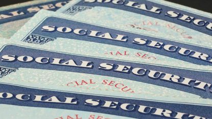 A stack of Social Security benefits cards
