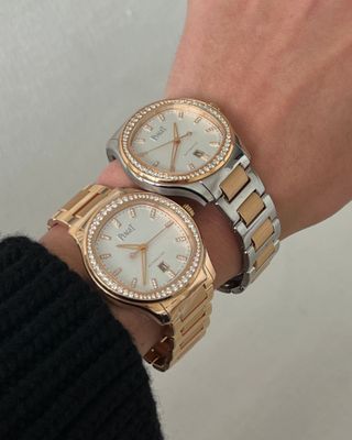  @elizagracehuber wearing two Piaget watches, one in rose gold with diamonds and one with steel and rose golds and diamonds.