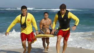 The lifeguards of &quot;Rescue Hi-Surf&quot; engage in a rescue