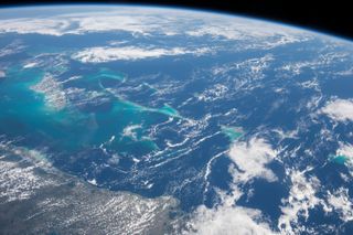 "The striking turquoise of the Bahamas stands out amid more muted ocean shades. These aquamarine waters were even visible on moonlit nights," describes astronaut Terry Virts in "View from Above: An Astronaut Photographs the World," his new book published by National Geographic.