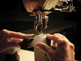 Zegna shoe heel being stitched on a sewing machine