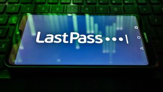 LastPass logo on huawei phone sitting on laptop keyboard