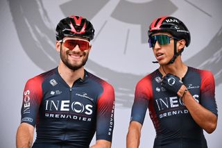 SCHAUINSLAND GERMANY AUGUST 27 LR Filippo Ganna of Italy Egan Arley Bernal Gomez of Colombia and Team INEOS Grenadiers during the team presentation prior to the 37th Deutschland Tour 2022 Stage 3 a 1489km stage from Freiburg to Schauinsland 1200m DeineTour on August 27 2022 in Schauinsland Germany Photo by Stuart FranklinGetty Images