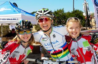 Catharine Pendrel (Luna Pro Team) with two young Canadian racers