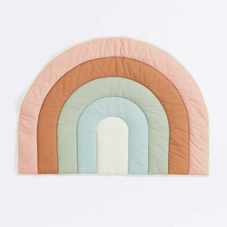 a rainbow baby mat