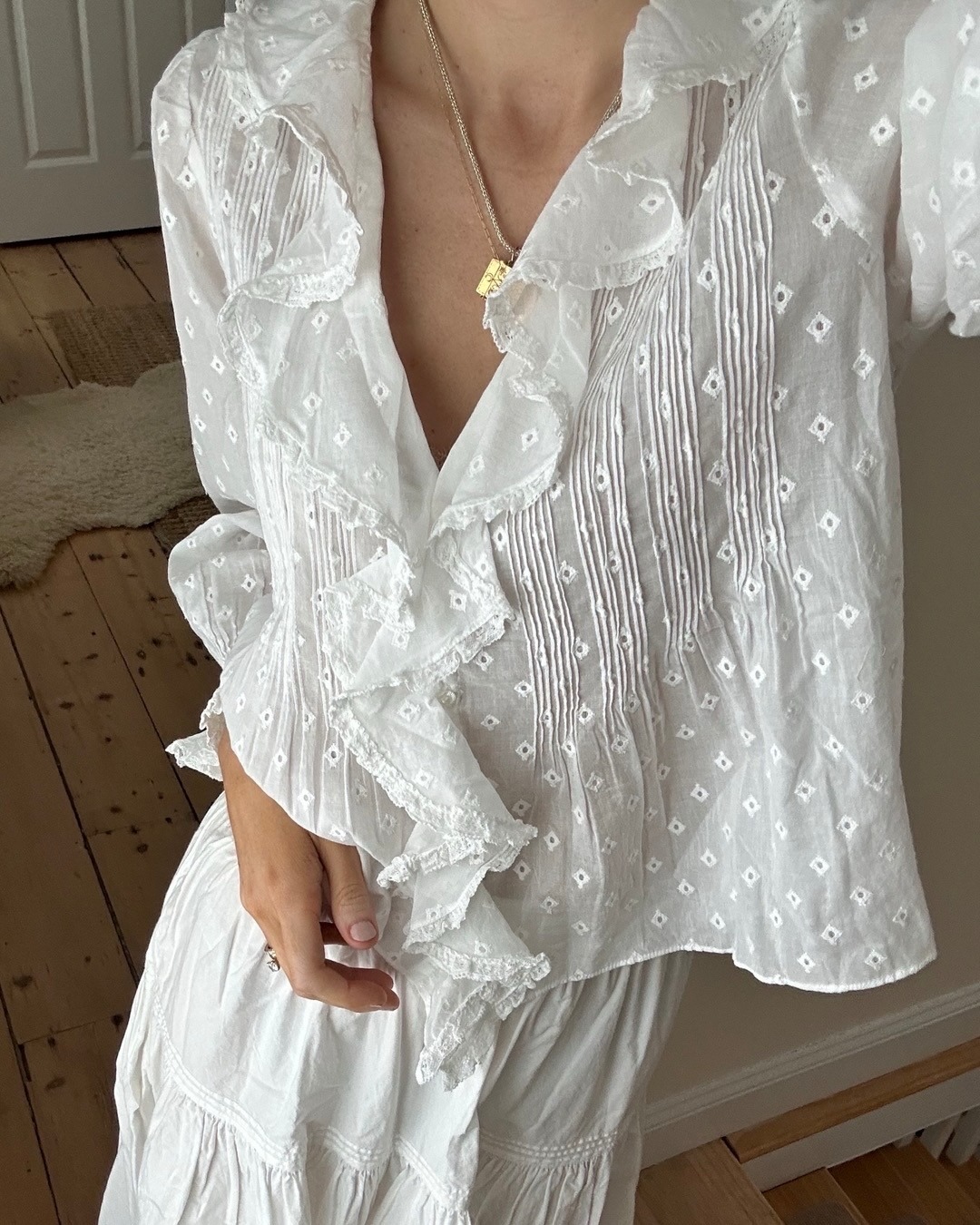 Cam wearing a Doen blouse.