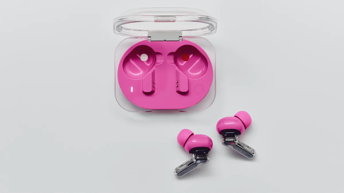Nothing Ear (3a) wireless earbuds in pink on a grey background