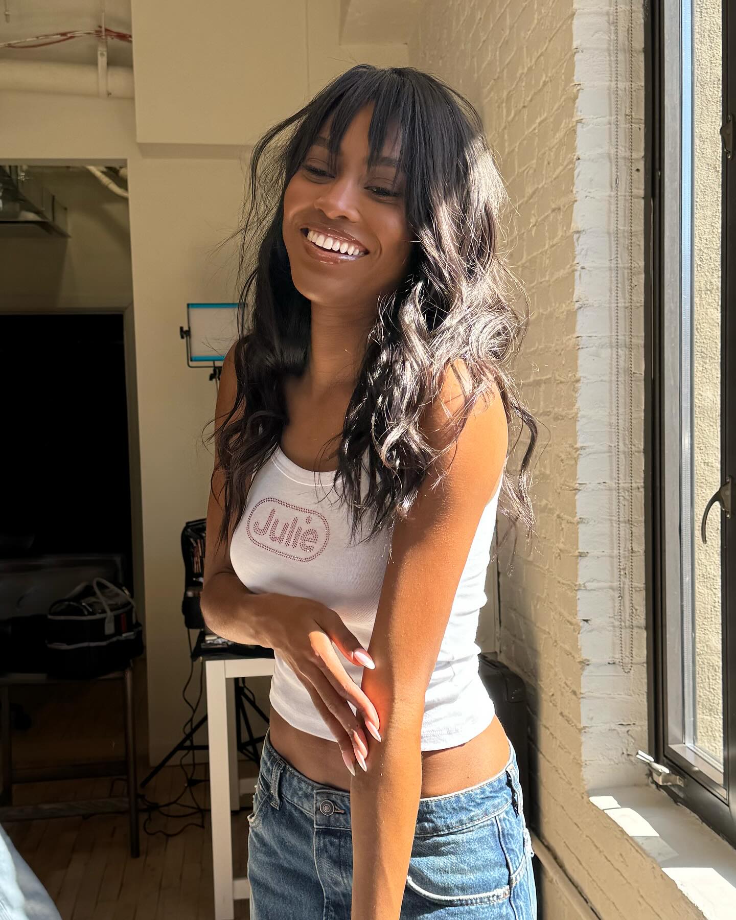 Ciara Miller with wispy bangs.