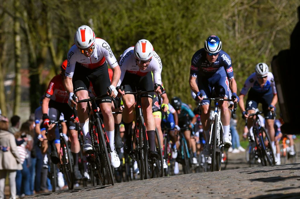 KOKSIJDE BELGIUM MARCH 18 LR Piet Allegaert of Belgium and Max Walscheid of Germany and Team Cofidis compete through cobblestones sector during the 20th Bredene Koksijde Classic 2022 a 2009km one day race from Bredene to Koksijde bredenekoksijde on March 18 2022 in Koksijde Belgium Photo by Luc ClaessenGetty Images