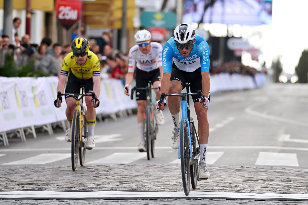 UBEDA SPAIN FEBRUARY 12 Bastien Tronchon of France and Decathlon Ag2R La Mondiale Team crosses the finish line as second place ahead of Jan Tratnik of Slovenia and Team Visma Lease a Bike and Tim Wellens of Belgium and UAE Team Emirates during the 3rd Clasica Jaen Paraiso Interior 2024 a 1583km one day race from Baeza to Ubeda on February 12 2024 in Ubeda Spain Photo by Tim de WaeleGetty Images