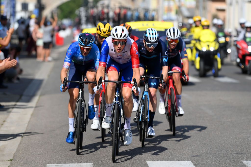 SAINTETIENNE FRANCE JULY 15 LR Hugo Houle of Canada and Team Israel Premier Tech Stefan Kng of Switzerland and Team Groupama FDJ and Matteo Jorgenson of United States and Movistar Team compete in the breakaway during the 109th Tour de France 2022 Stage 13 a 1926km stage from Le Bourg dOisans to SaintEtienne 488m TDF2022 WorldTour on July 15 2022 in SaintEtienne France Photo by Alex BroadwayGetty Images