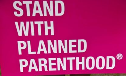 In April 2011, a college student protests in Washington, D.C.: In Texas, more than a dozen Planned Parenthood clinics closed last year.