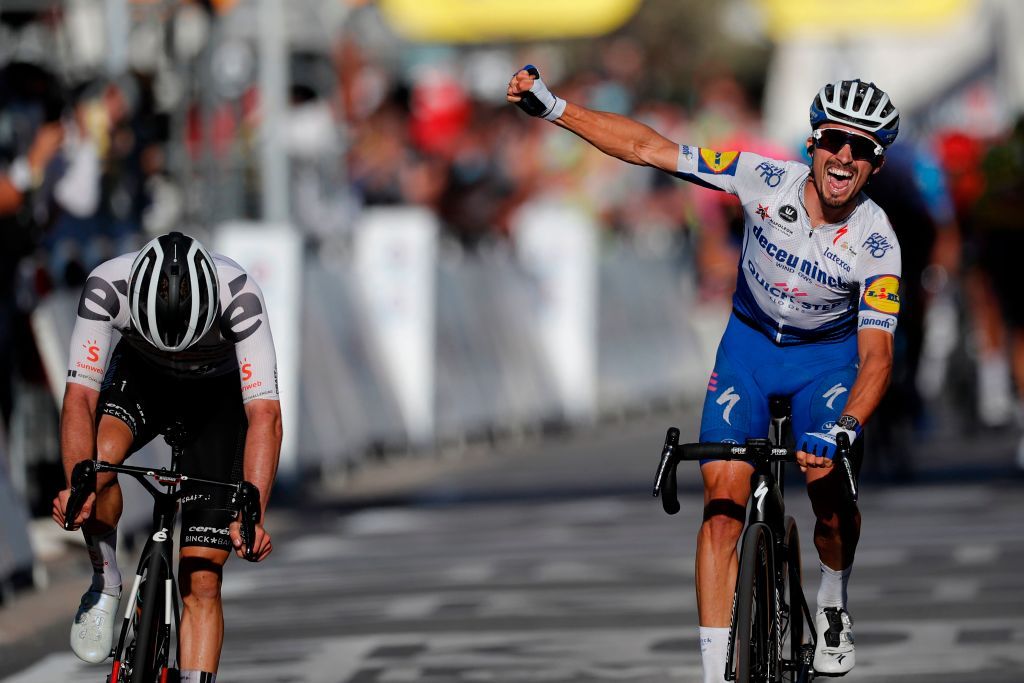 Team Deceuninck rider Frances Julian Alaphilippe R celebrates as he crosses the finish line ahead of Team Sunweb rider Switzerlands Marc Hirschi during the 2nd stage of the 107th edition of the Tour de France cycling race 187 km between Nice and Nice on August 30 2020 Photo by STEPHANE MAHE POOL AFP Photo by STEPHANE MAHEPOOLAFP via Getty Images