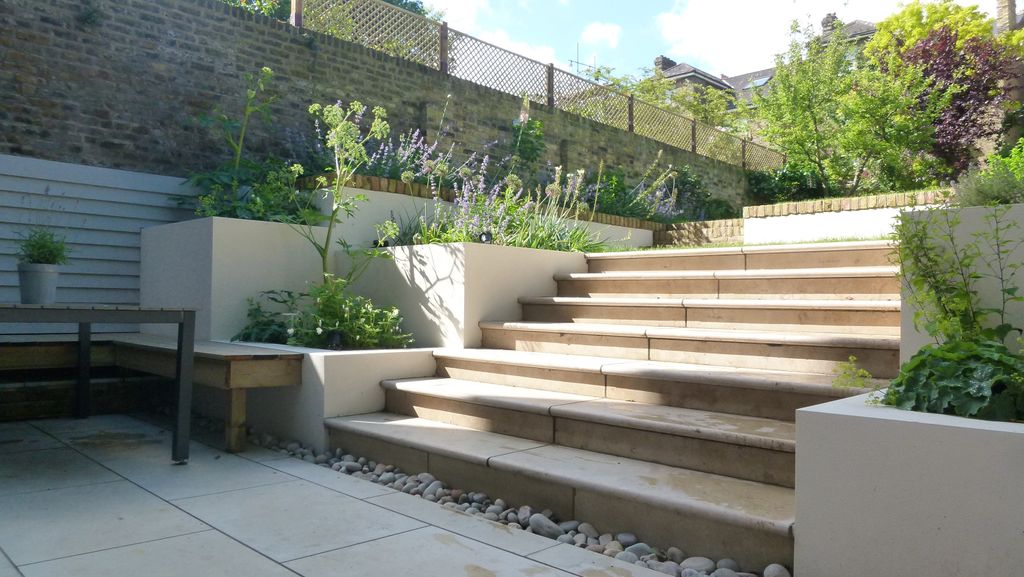 Sloping garden ideas: 20 landscaping and styling solutions for plots on