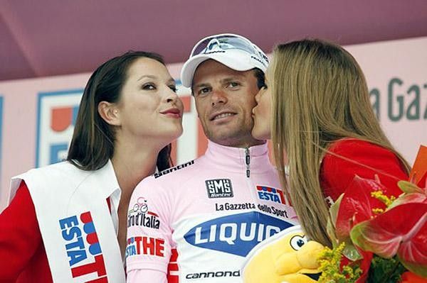 Di Luca on the podium his cheeks must be getting sore from all the kisses they've received