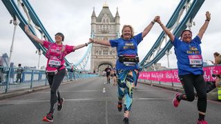 Runners crossing Tower Bridge during The Vitality Big Half, Sunday 22 August 2021.