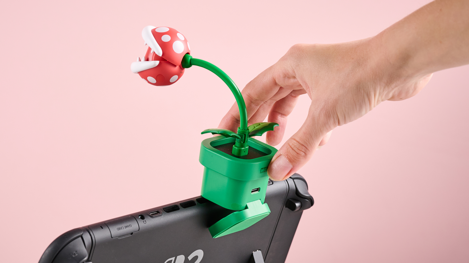 Someone mounting Hori Piranha Plant Camera for Nintendo Switch 2
