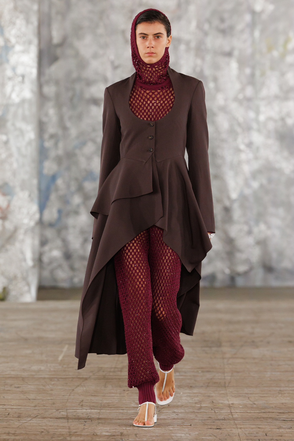 Diotima Spring/Summer 26 catwalk - brown jacket, burgundy fishnet jumpsuit