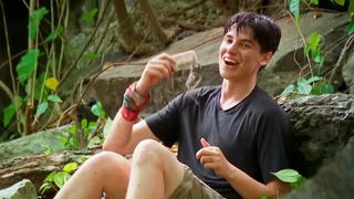 Rizo shows off his idol during a confessional on Survivor.